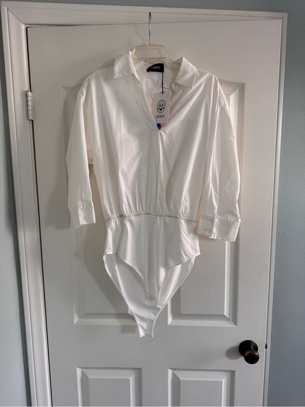 CIDER White Collared One-Piece Bodysuit